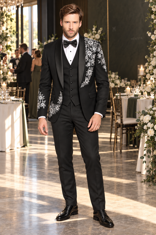 Jack wearing Alaric black white daisy floral embroidered three-piece tuxedo, full front view with a plain five-button waistcoat.