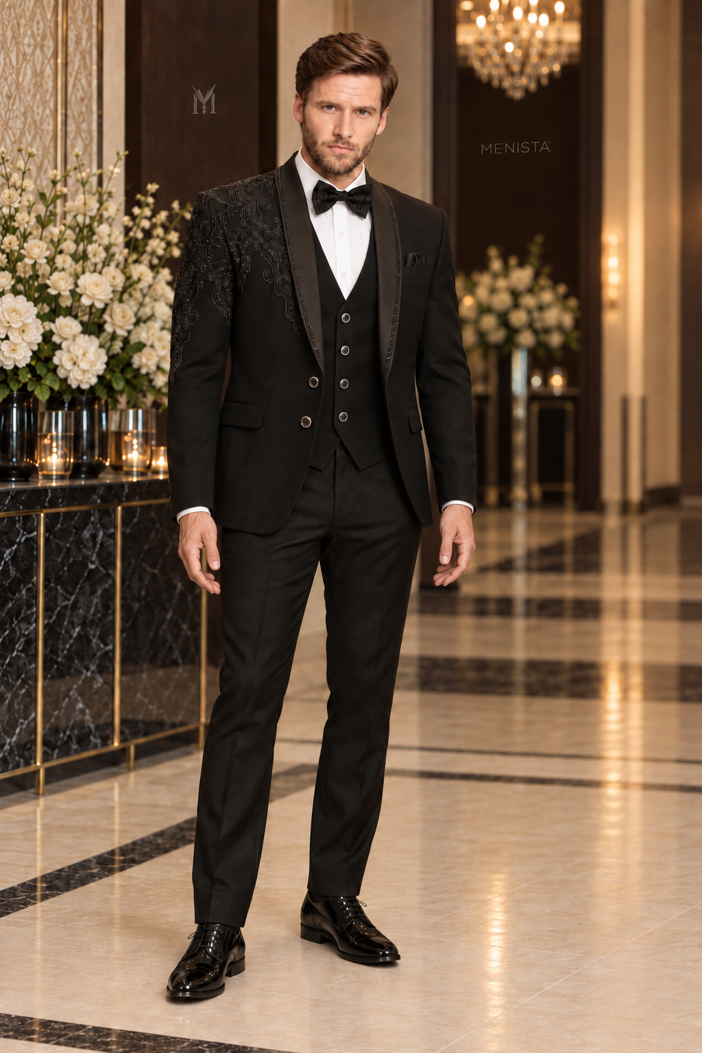 Jack wearing Alder black paisley beaded three-piece tuxedo, full-length front view