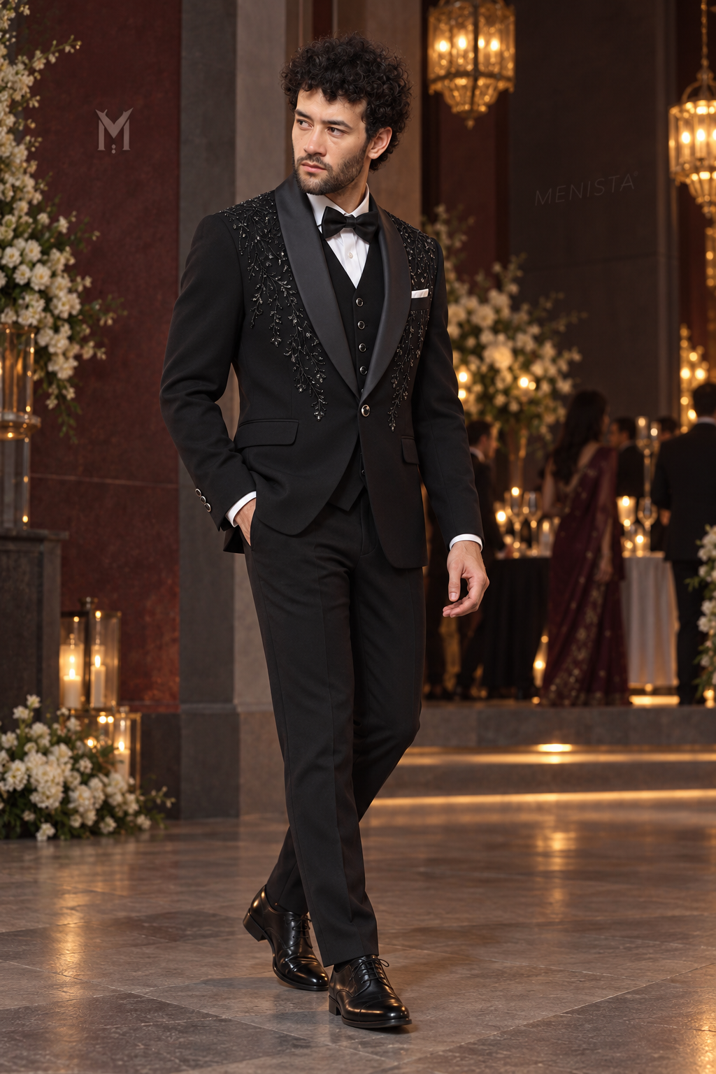 Three-quarter view of Cyran Black Botanical Beaded 3PC Tuxedo with one-button jacket and satin shawl lapels.