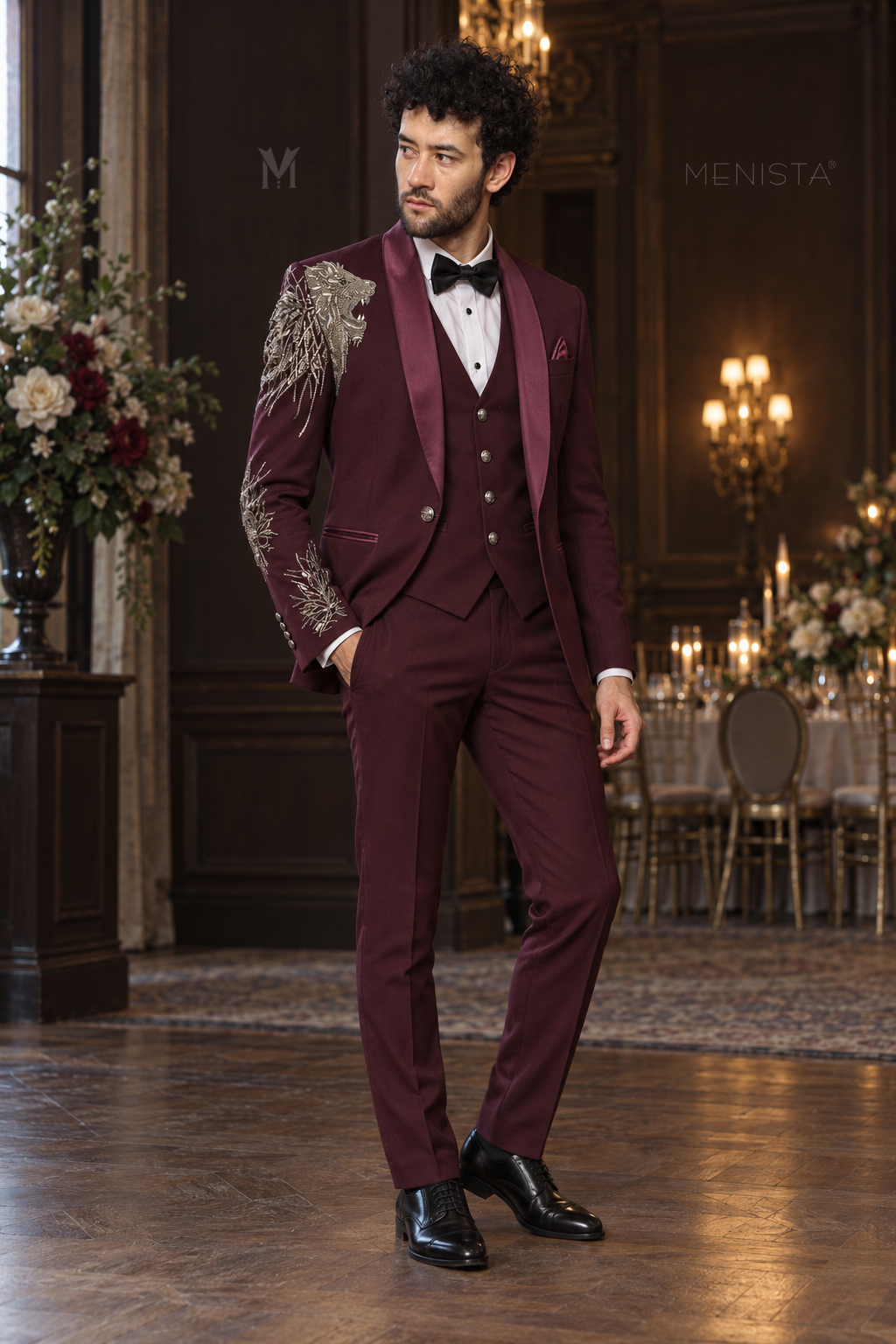 Three-quarter view of Leonis burgundy tuxedo with silver-tone lion bead embroidery