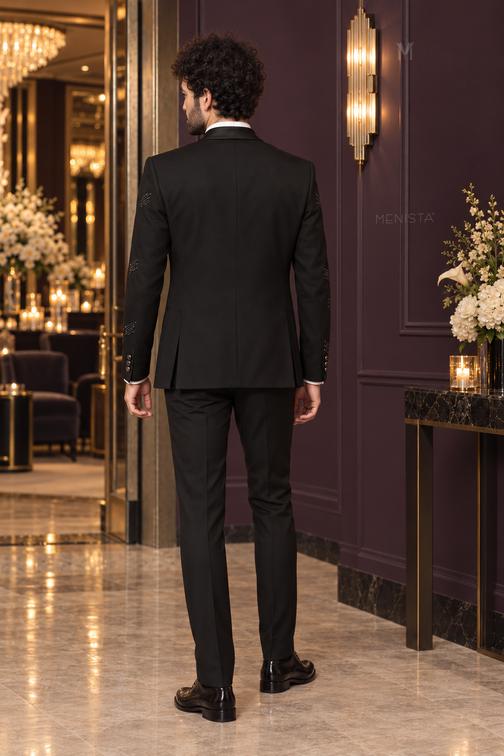 Full back view of Noctis black tuxedo showing plain back, centre seam and two side vents.