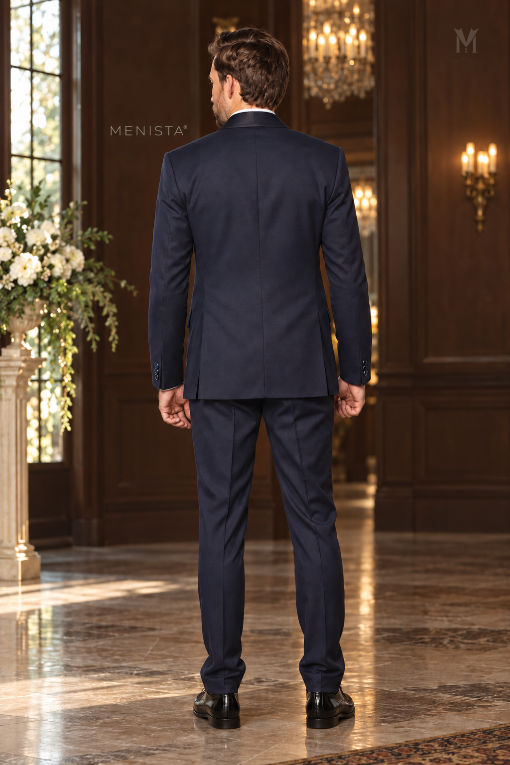 Full back view of Menista Sylvan navy tuxedo showing plain jacket back, two side vents and matching trousers.