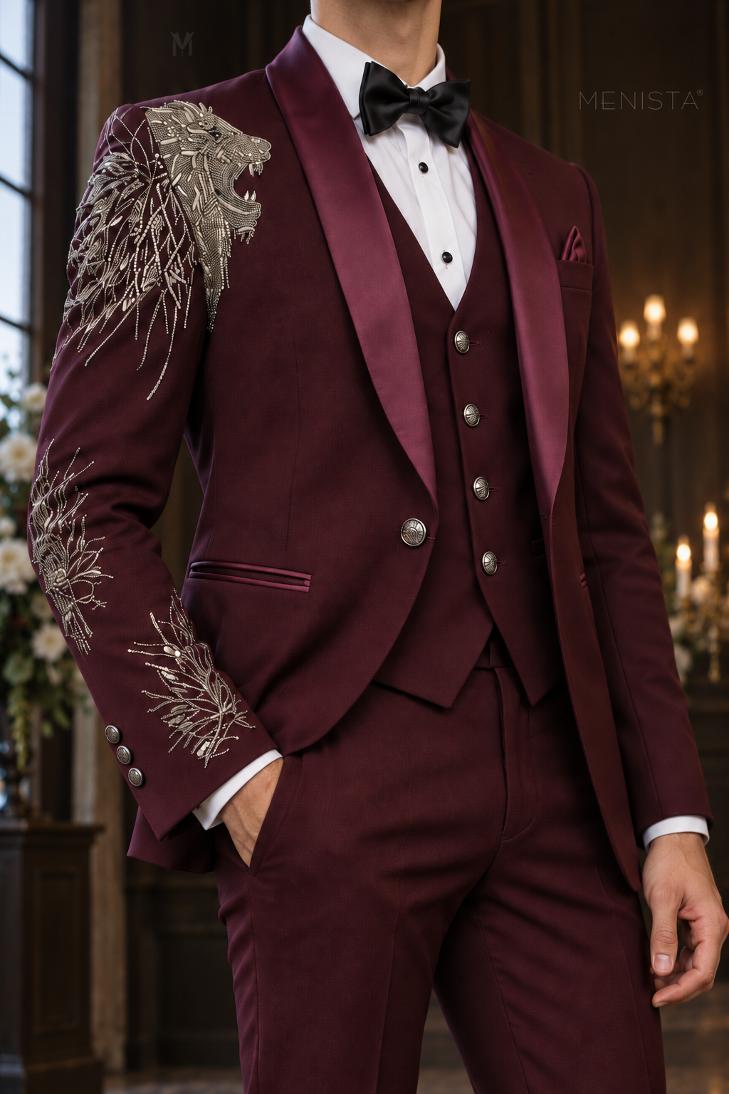 Close-up of Leonis silver-tone lion embroidery, burgundy satin shawl lapels and single button