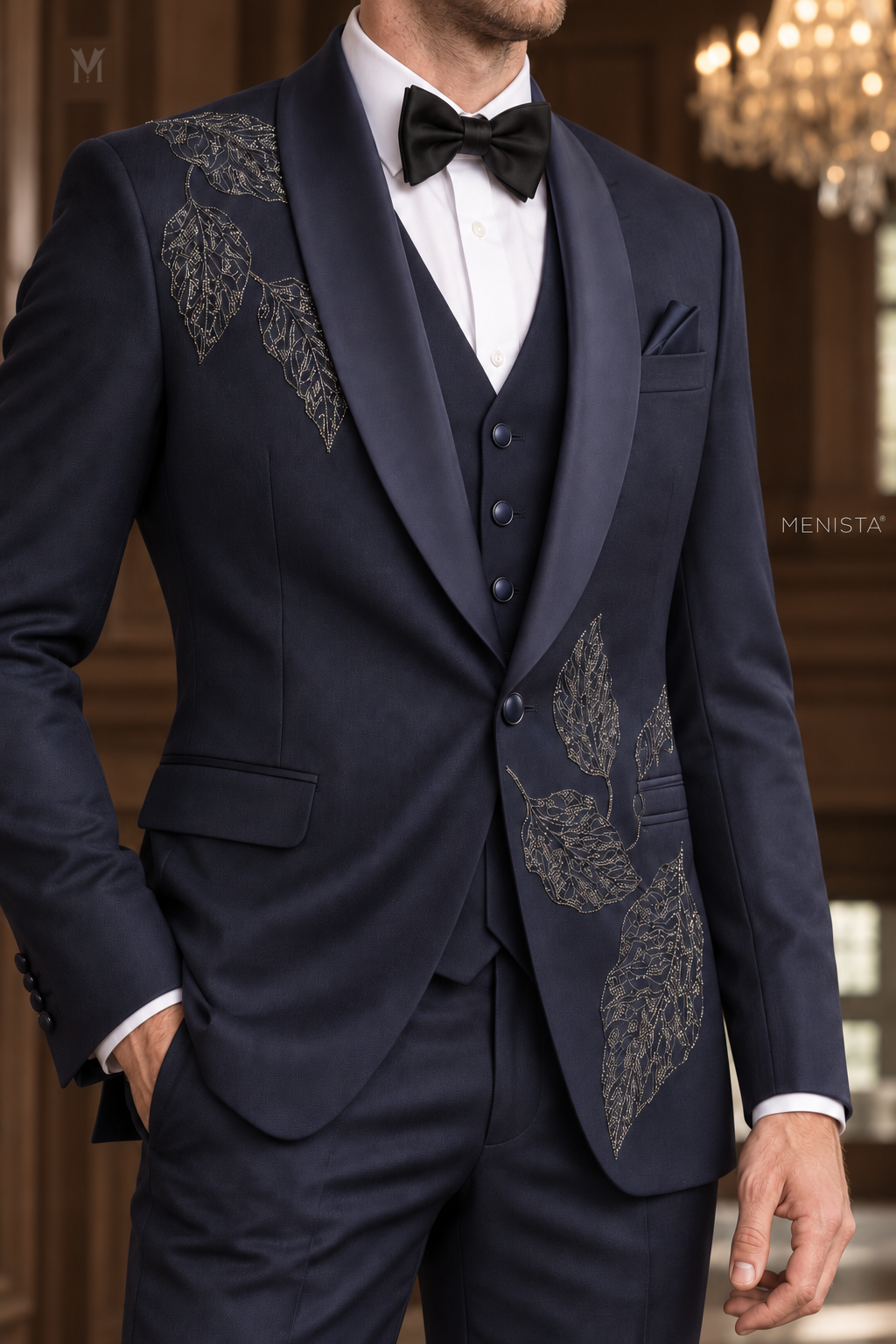 Close-up of Sylvan navy tuxedo silver leaf bead embroidery, satin shawl lapels and one-button jacket construction.
