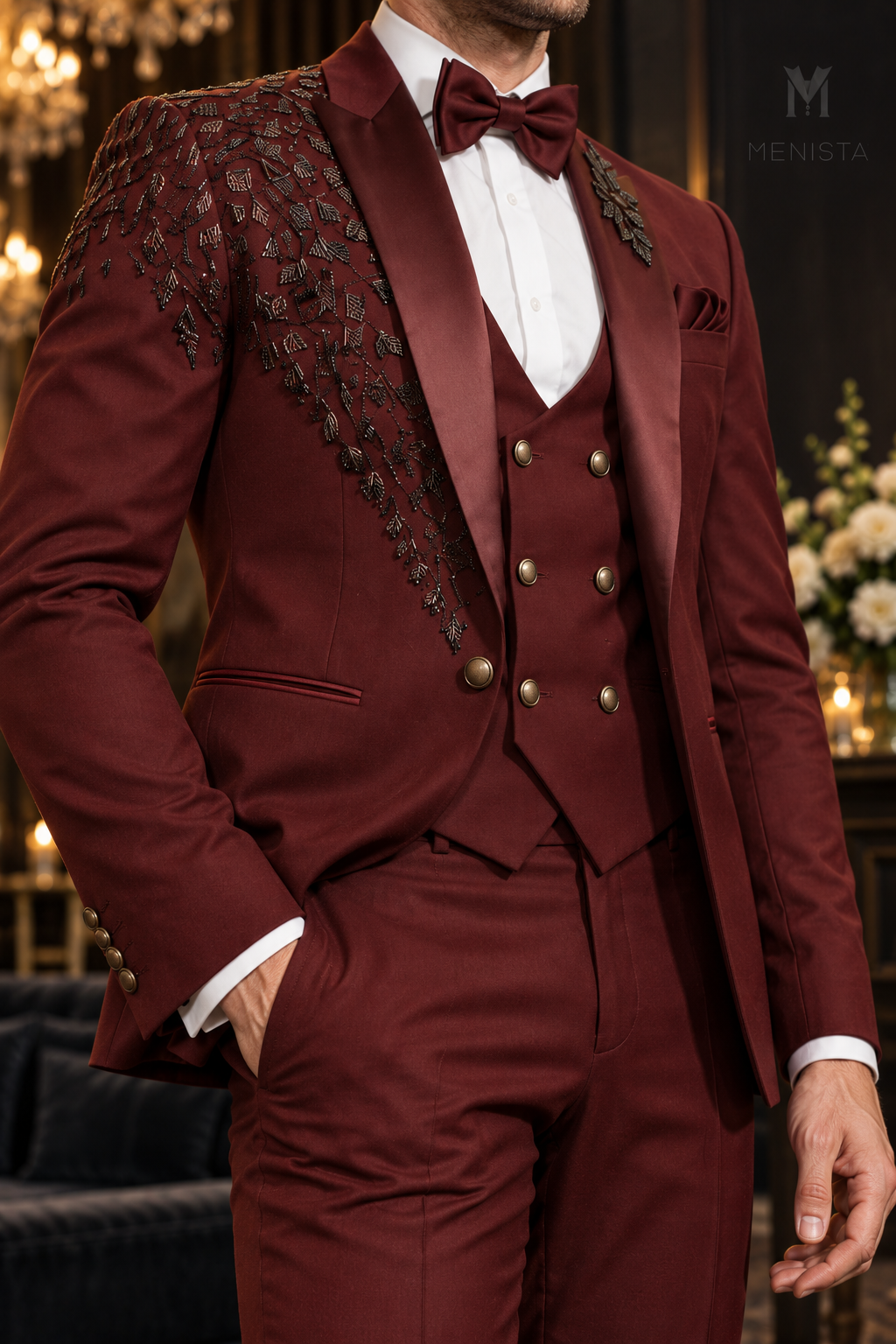 Close-up of Valen’s burgundy satin shawl lapels, dark leaf bead embroidery and bronze-tone buttons